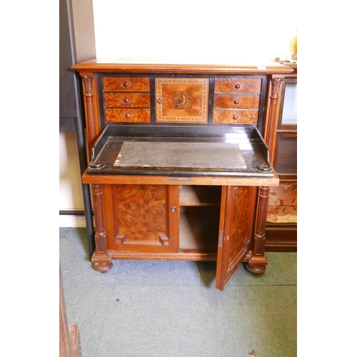 1821 - A C19th continental secretaire abattant with burr walnut panels, the fall front fitted with an eboni... 