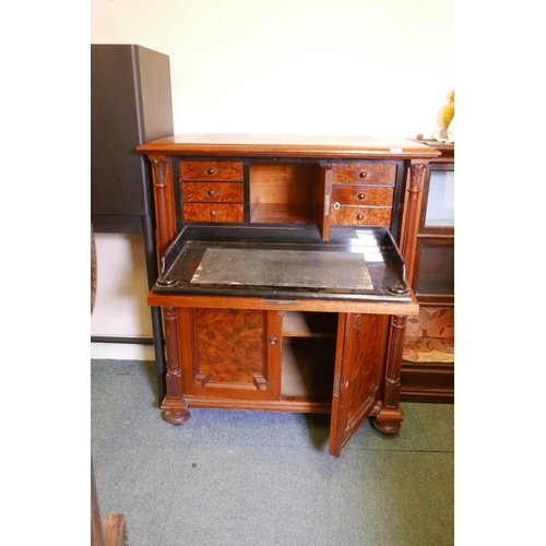 1821 - A C19th continental secretaire abattant with burr walnut panels, the fall front fitted with an eboni... 