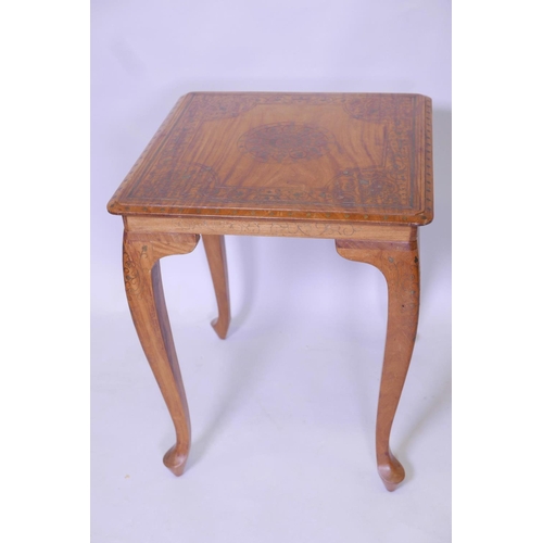 1823 - An oriental brass inlaid occasional table on cabriole legs, 22