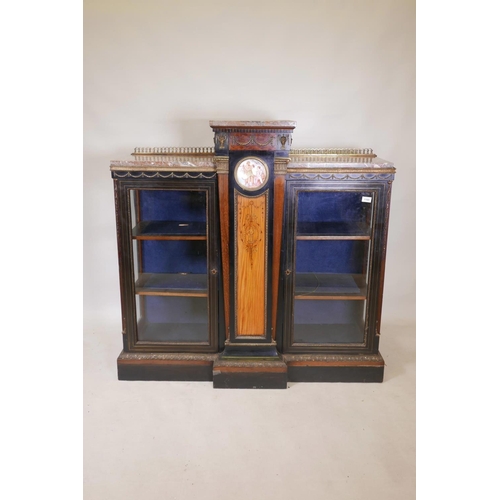 1830 - A C19th French breakfront pier cabinet, with brass inlaid ebonised doors and gilt brass classical mo... 