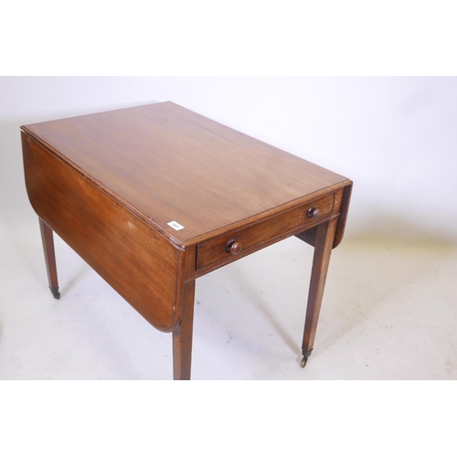 1857 - A George III mahogany pembroke table with single end drawer, raised on tapering supports, 36