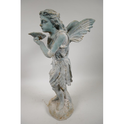 3 - A cast metal garden figure of a fairy, 20