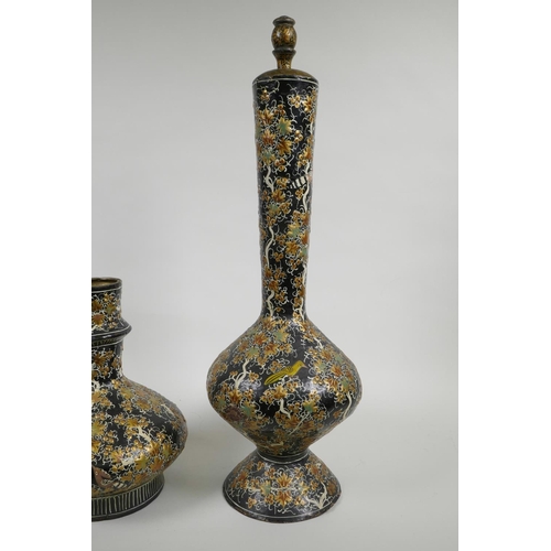 41 - A Kashmiri papier mâché and brass hookah base, and another similar, decorated with birds amongst gil... 