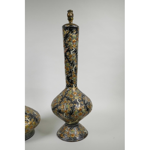 41 - A Kashmiri papier mâché and brass hookah base, and another similar, decorated with birds amongst gil... 