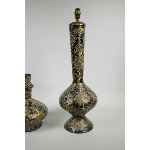 41 - A Kashmiri papier mâché and brass hookah base, and another similar, decorated with birds amongst gil... 