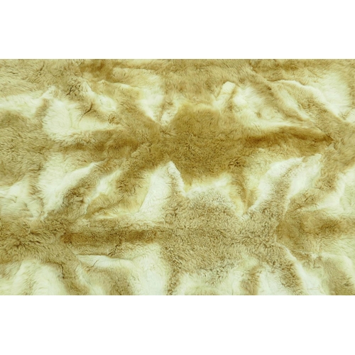 44 - A fur blanket by Maxwell Croft of London, 66