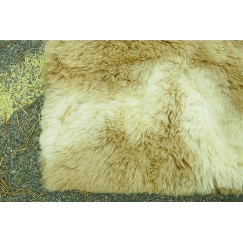 44 - A fur blanket by Maxwell Croft of London, 66