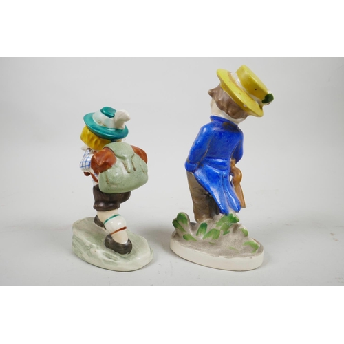 49 - Two 1950s Goebel Hummel style figures, one of a German boy mountaineering, and another of a boy in t... 