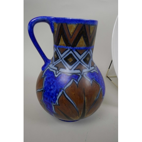 52 - A Clewes Chameleon ware pottery jug with blue and brown glaze together with a Rosenthal charger 13