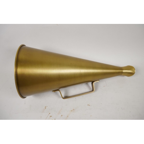 6 - A brass megaphone, 15