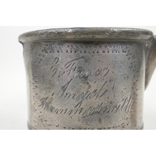 59 - An C18th pewter tankard repurposed to a jug in the mid C19th and belonging to Edwin Faux, landlord o... 