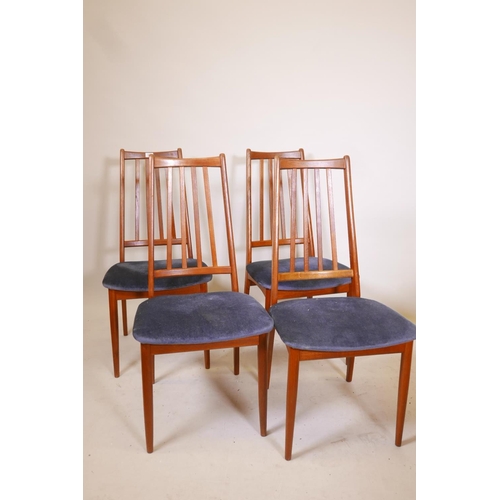 1860 - A set of four Danish mid century teak chairs with slat backs