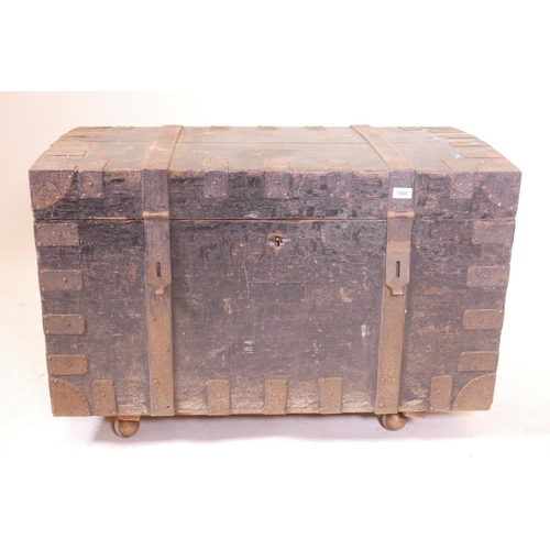 1866 - A C19th pine and iron strapped travelling chest, 39