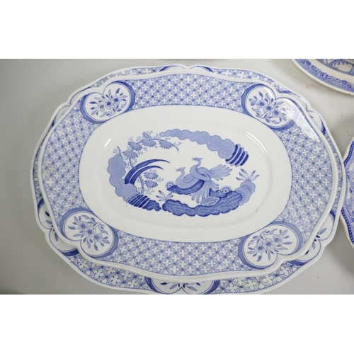 11 - A quantity of English blue and white pottery including three old Chelsea Pattern oval platters, two ... 