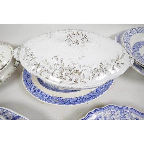 11 - A quantity of English blue and white pottery including three old Chelsea Pattern oval platters, two ... 