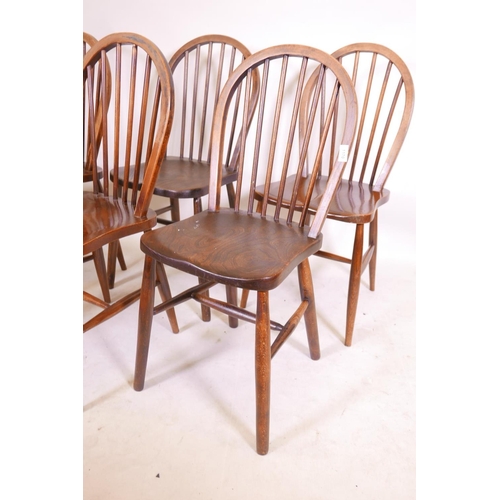 1170 - A matched set of five hoop back chairs, some with elm seats