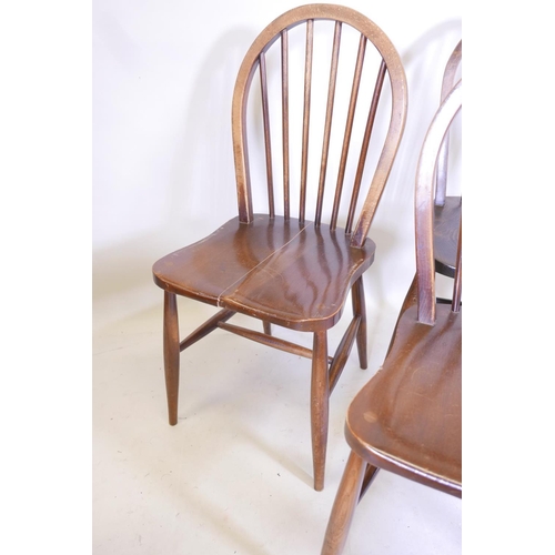 1170 - A matched set of five hoop back chairs, some with elm seats