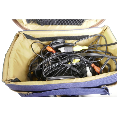 13 - A Hitachi VM-E535LE digital video camera with charger, remote etc in a Benetton carry case