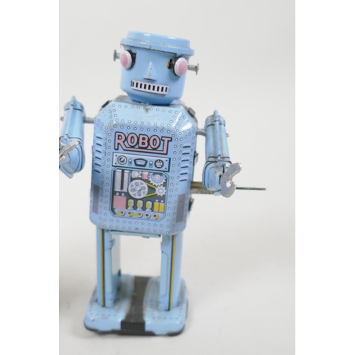 20 - A Chinese tin plate walking toy robot, 5