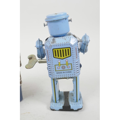 20 - A Chinese tin plate walking toy robot, 5