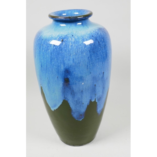 23 - A studio pottery vase with blue and green drip glaze, 13