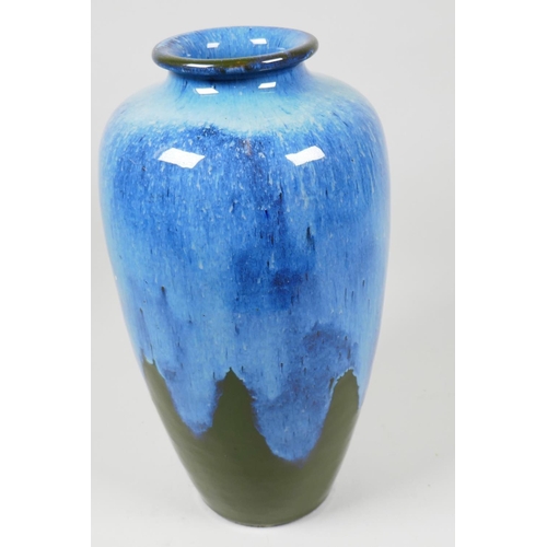 23 - A studio pottery vase with blue and green drip glaze, 13