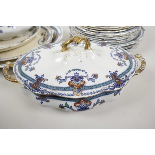 27 - A C19th Staffordshire part dinner service including three oval platters, two oval tureens and covers... 