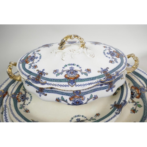 27 - A C19th Staffordshire part dinner service including three oval platters, two oval tureens and covers... 