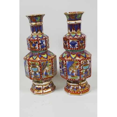 32 - A pair of clobbered Chinese porcelain vases of double gourd form with slender necks, painted with ob... 