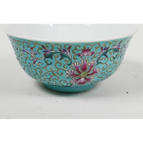 53 - A Chinese porcelain rice bowl painted with bats and flowers on a turquoise ground, 5¼