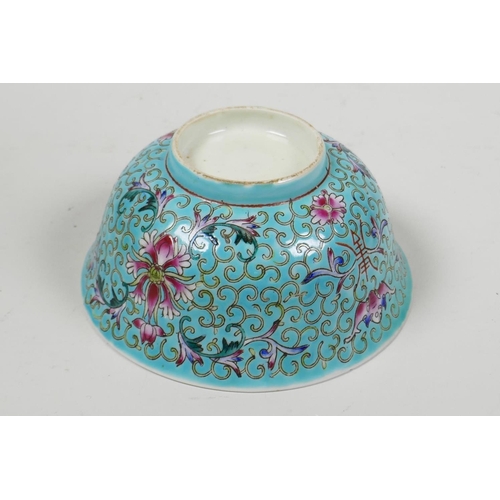 53 - A Chinese porcelain rice bowl painted with bats and flowers on a turquoise ground, 5¼