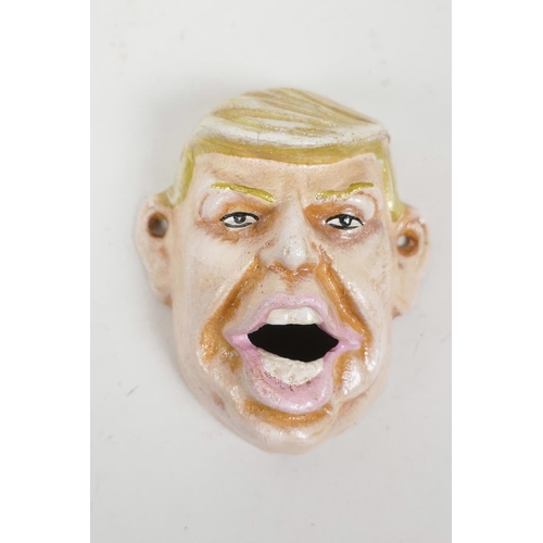 56 - A painted cast metal Donald Trump bottle opener, 4