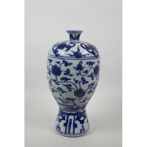 58 - A Chinese blue and white Ming style vase with scrolling lotus flower decoration, 11½