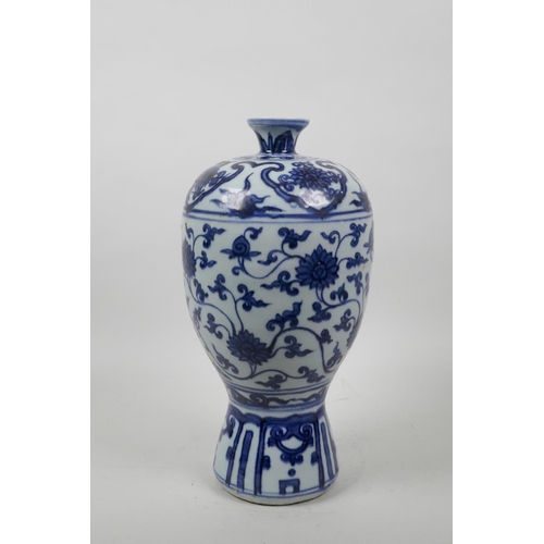 58 - A Chinese blue and white Ming style vase with scrolling lotus flower decoration, 11½