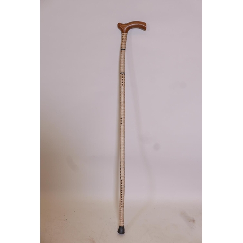 65 - A 19C shark vertebrae walking stick, 34