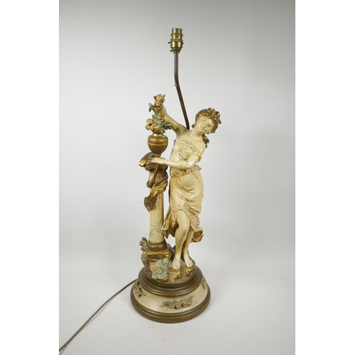 67 - A painted spelter lamp in the form of a classical maiden, 30