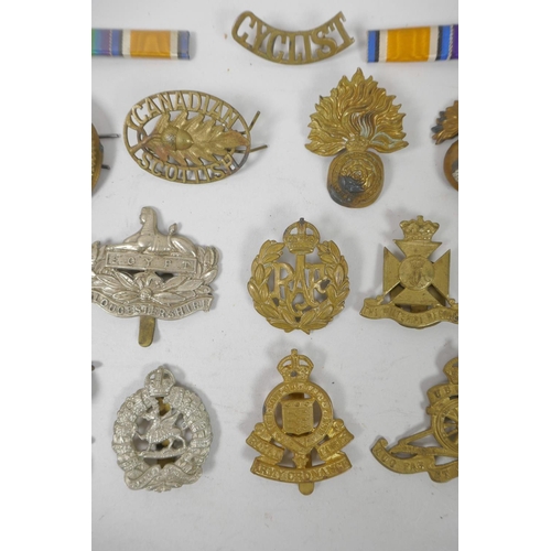 12 - A quantity of assorted British Forces and other service badges