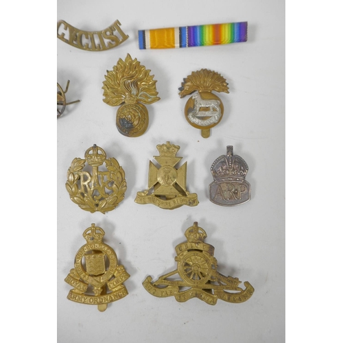 12 - A quantity of assorted British Forces and other service badges