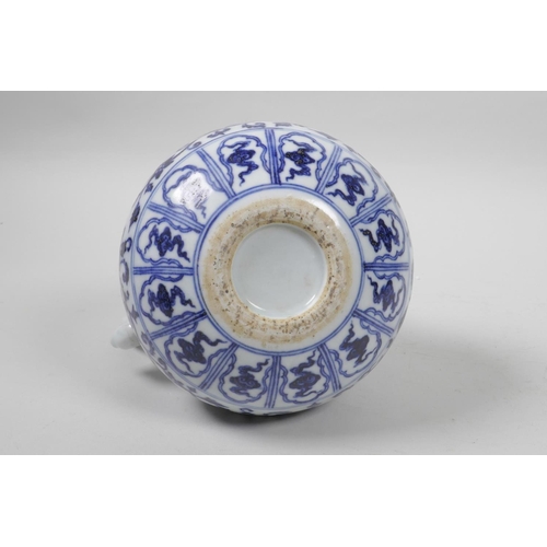 15 - A Chinese blue and white porcelain Ming style jug with scrolling lotus flower decoration, 4 characte... 