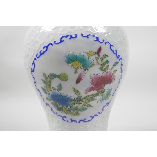 20 - A Chinese porcelain meiping vase with decorative famille verte enamelled panels depicting flowers in... 