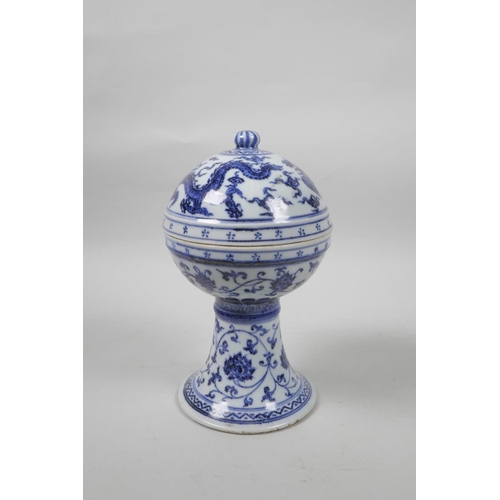 35 - A Chinese blue and white porcelain stem bowl and cover, with scrolling lotus flower, dragon and phoe... 