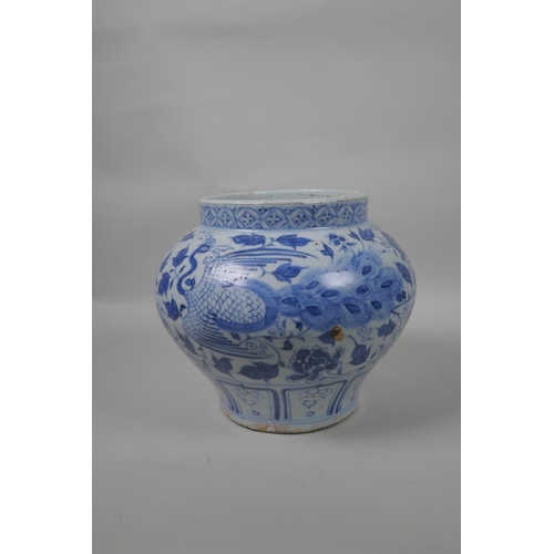 38 - A Chinese blue and white Yuan style jar decorated with phoenix and flowers, 8