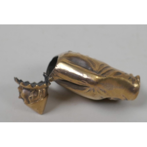 42 - A brass vesta case in the form of a clown, 2¼