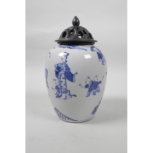 45 - A Chinese blue and white porcelain jar with an associated pierced wood cover, decorated with figures... 