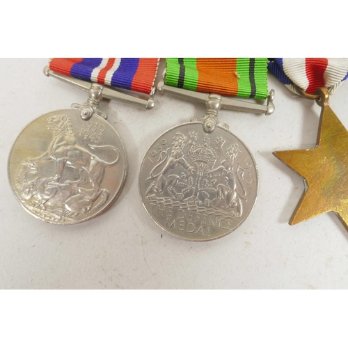 29 - A set of three British Second World War service medals together with a WW2 campaign medal