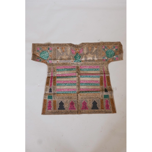 14 - An Islamic linen robe with all over calligraphic decoration, 34