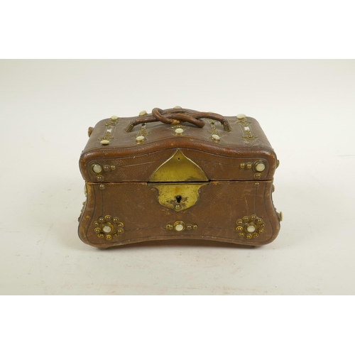 19 - An early C20th leather jewellery casket with brass and mother of pearl detail, 7