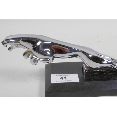 2 - A chrome plated Jaguar car mascot mounted on a marble stand, 7½