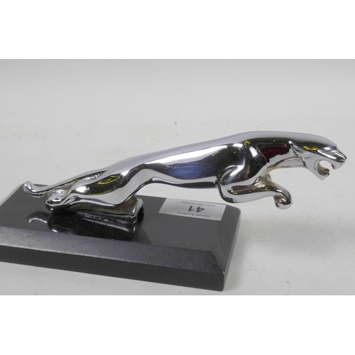 2 - A chrome plated Jaguar car mascot mounted on a marble stand, 7½