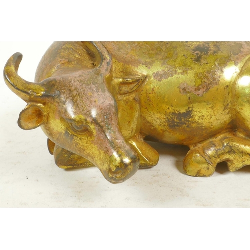 22 - A Chinese gilt bronze figurine of a buffalo and his boy handler, 7